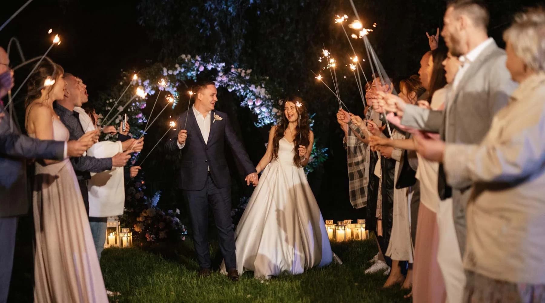 Wedding guests capturing photos that gather into one shared Flock album